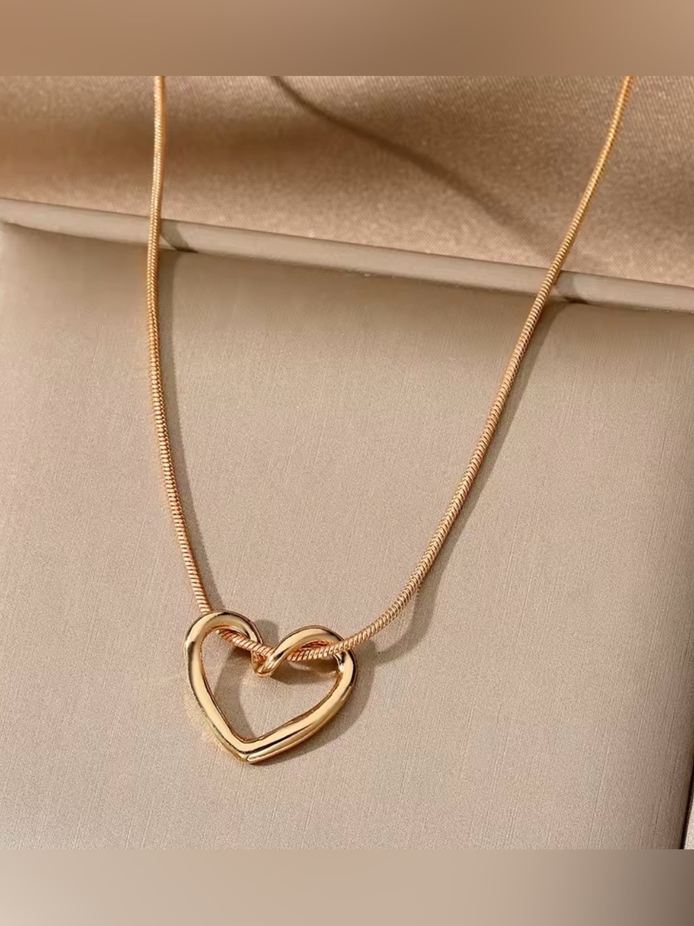 Gold Heart Knot Pendant Necklace